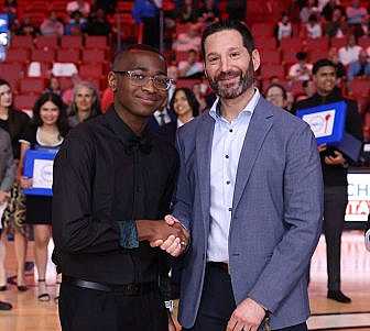 Carnival Corp. President and CEO Josh Weinstein with Kayden Johnson.