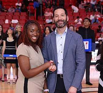 Carnival Corp. President and CEO Josh Weinstein with Ebonie Knight.