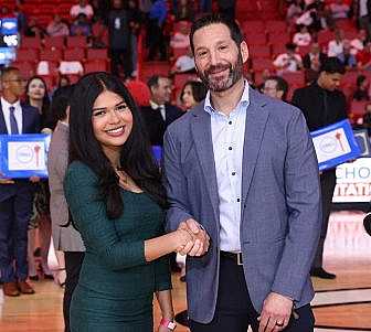 Carnival Corp. President and CEO Josh Weinstein with Emely Solorzano.