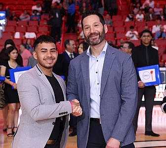 Carnival Corp. President and CEO Josh Weinstein with Yoseph Mendez-Acuna.