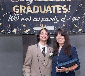 Linda Coll and graduating senior.