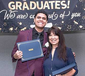 Linda Coll and graduating senior.