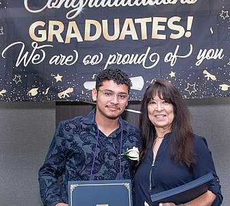 Linda Coll and graduating senior.