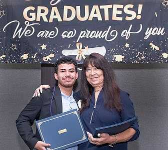 Linda Coll and graduating senior.