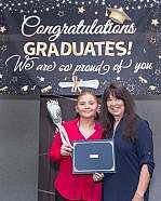 Linda Coll and graduating senior.